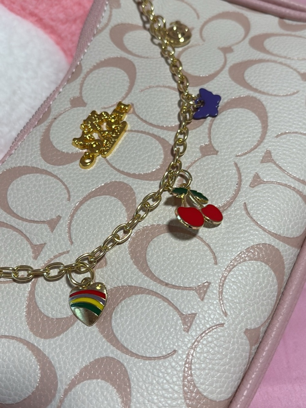 Coach Pink Signature Charm Wristlet with Gold Chain and Red Cherry Charm